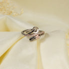 The gold-tone zircon finger ring adds a subtle yet sophisticated sparkle to any outfit.
