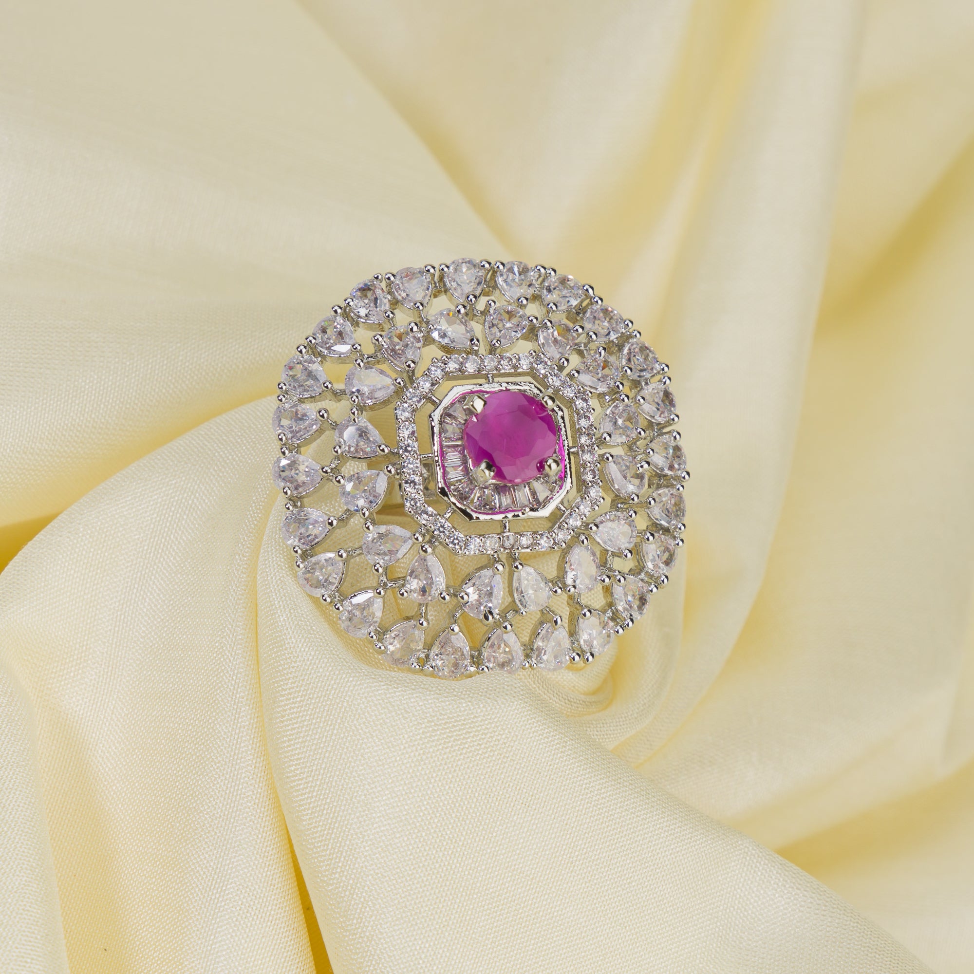Zircon finger ring with pink stone adds a delicate and elegant touch, perfect for any occasion.
