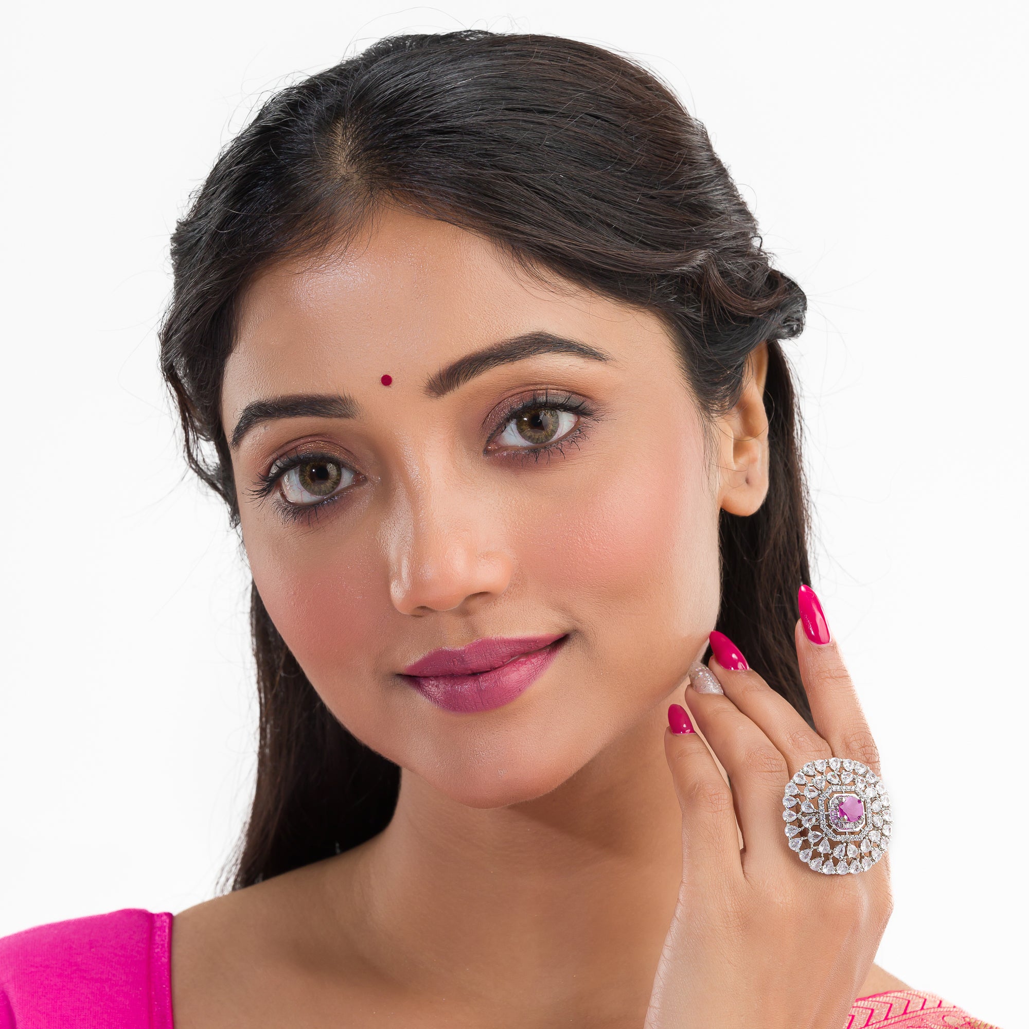 Zircon finger ring with pink stone adds a delicate and elegant touch, perfect for any occasion.
