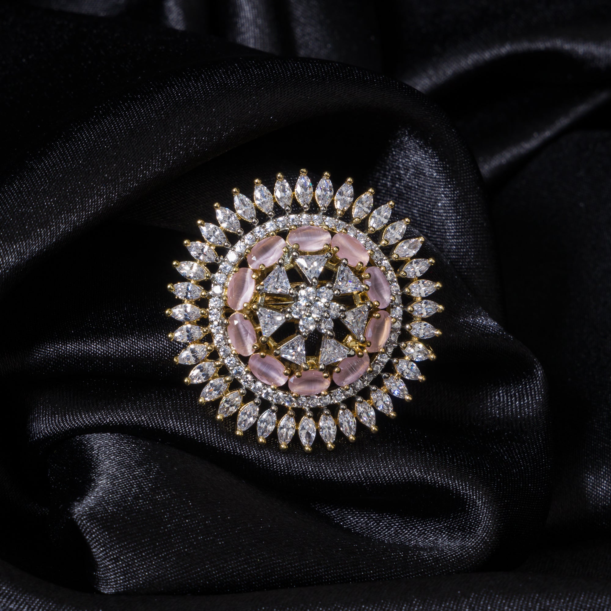 Zircon finger ring with orchid stones offers a vibrant, sophisticated sparkle for parties.
