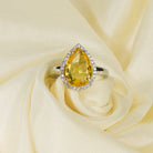 Zircon finger ring with yellow stone provides a bright and cheerful sparkle for casual wear.
