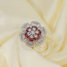 Red zircon finger ring in silver offers a bold and vibrant touch for party occasions.
