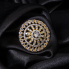 Golden zircon finger ring combines luxurious sparkle with a timeless gold-tone finish.
