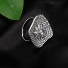 Silver zircon finger ring offers a dazzling design for a glamorous party-ready look.
