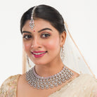 Orchid zircon bridal necklace set with earrings and maangtika.
