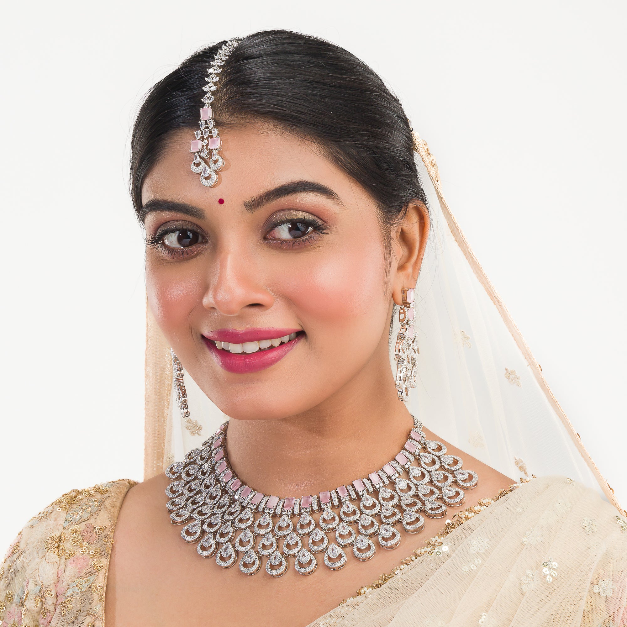 Orchid zircon bridal necklace set with earrings and maangtika.
