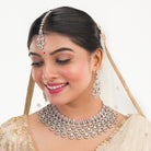 Orchid zircon bridal necklace set with earrings and maangtika.
