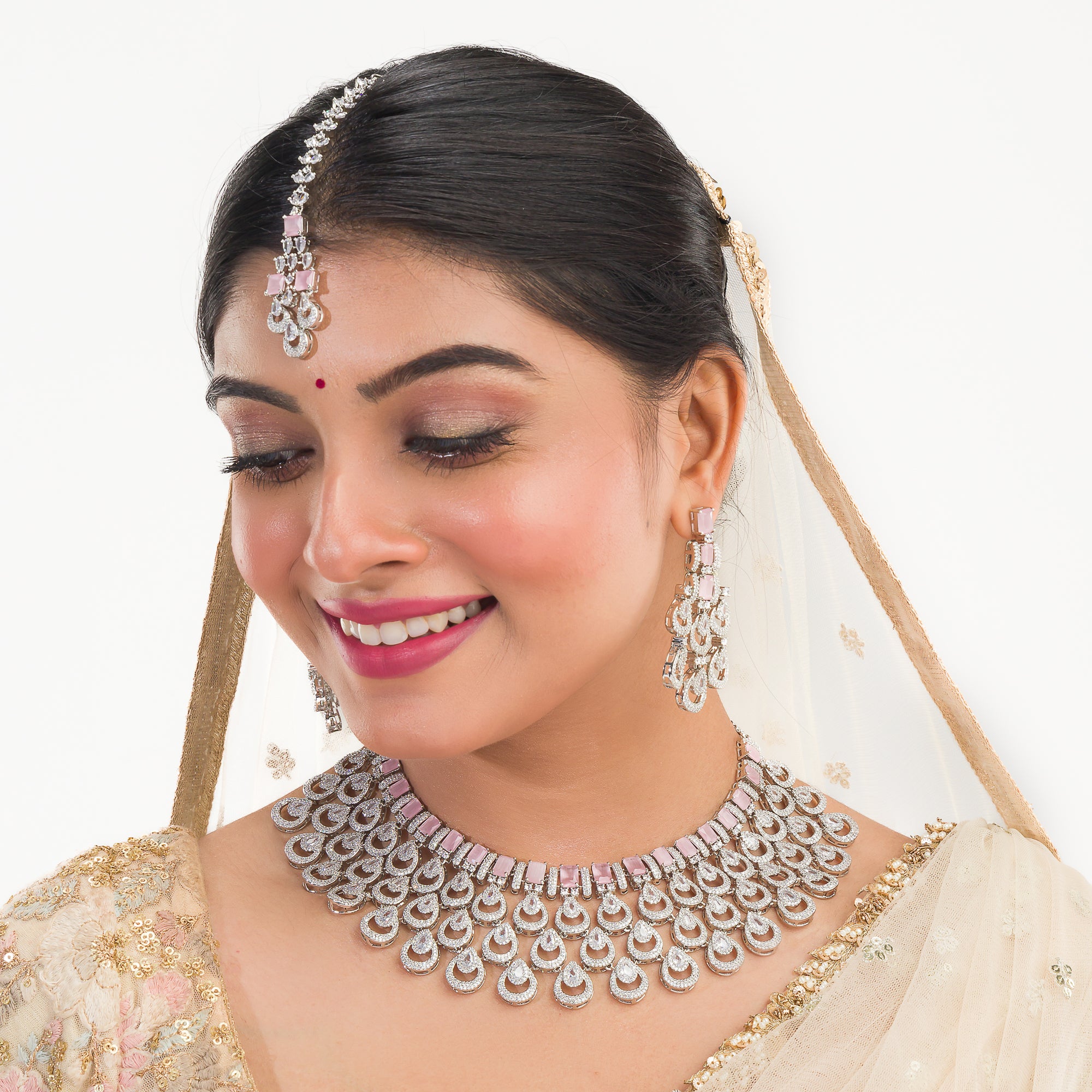 Orchid zircon bridal necklace set with earrings and maangtika.
