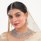 Orchid zircon bridal necklace set with earrings and maangtika.
