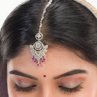 Pink zircon bridal necklace set with intricate stone design.
