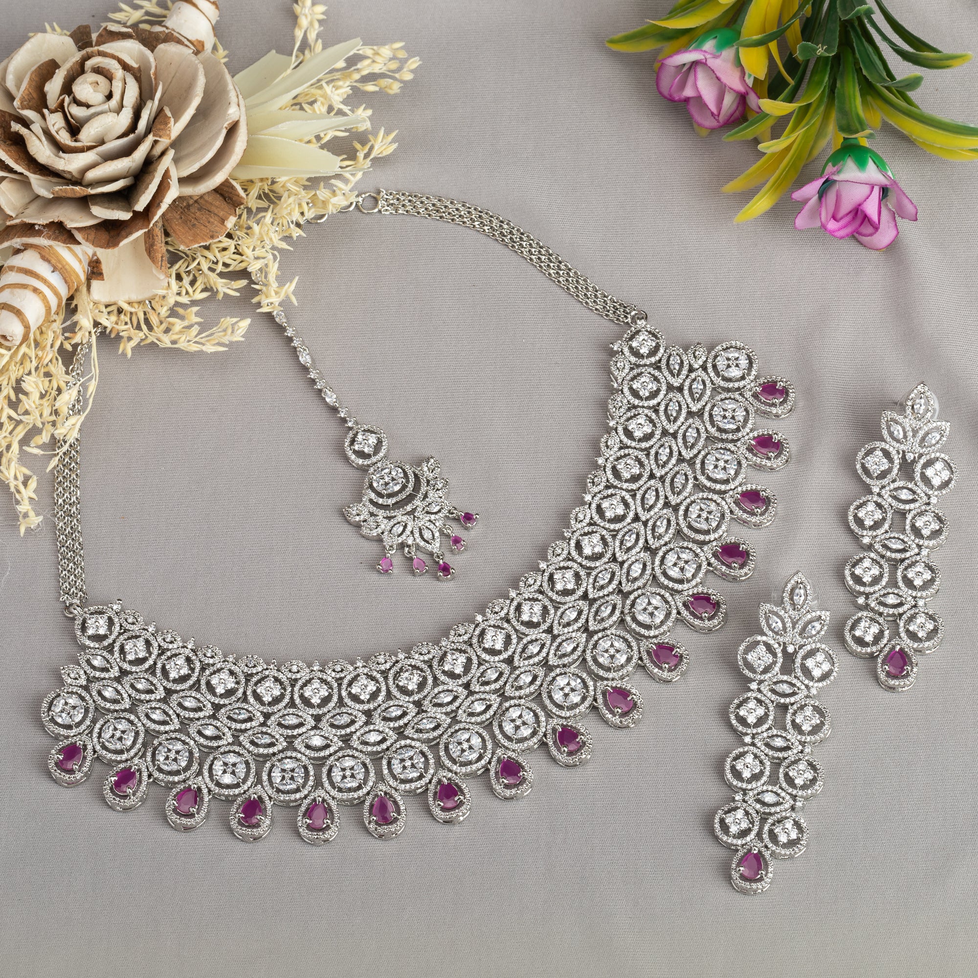 Pink zircon bridal necklace set with intricate stone design.
