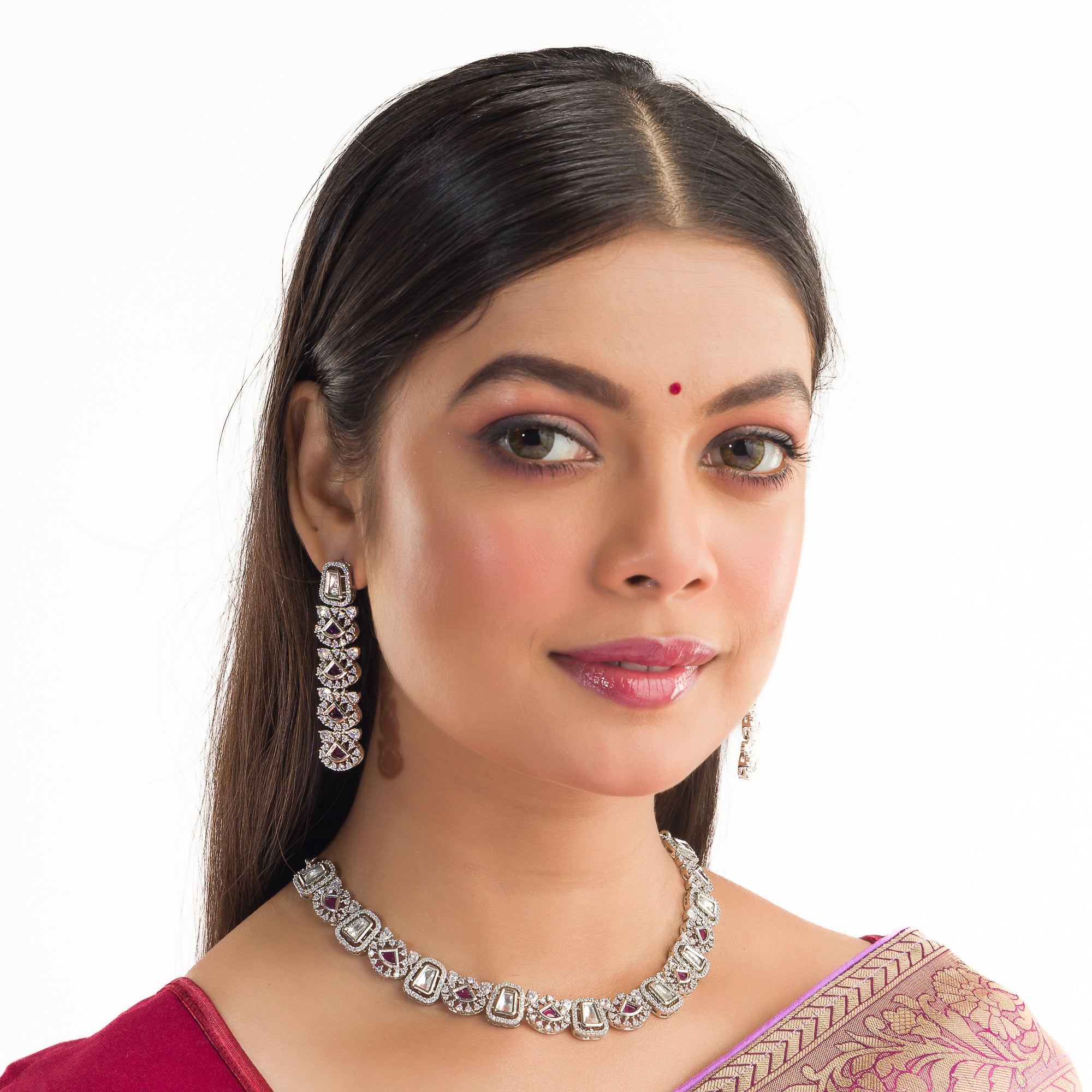 Purple zircon necklace set in silver for an elegant and stylish party look.
