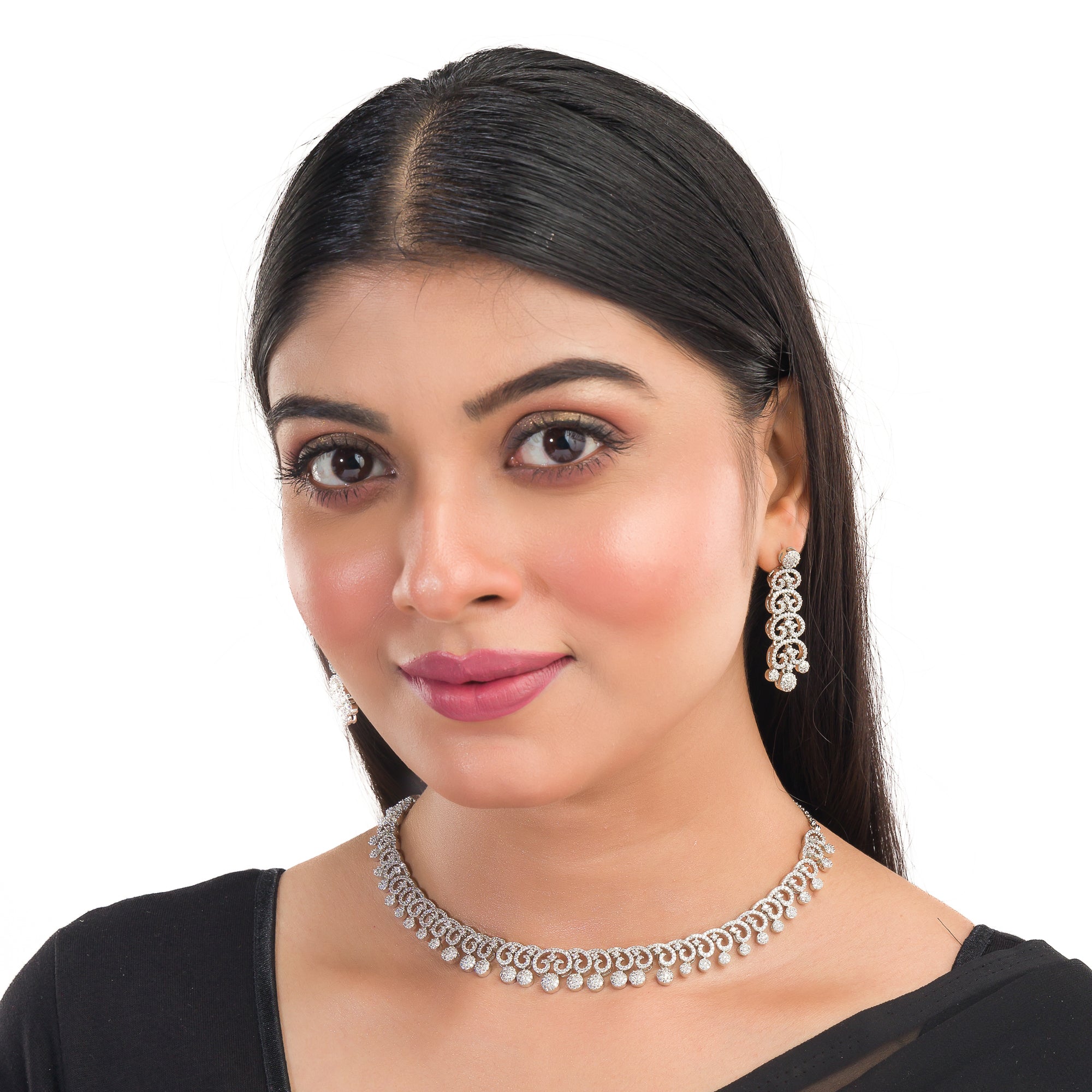 White zircon necklace set with matching earrings for timeless elegance and sophistication.
