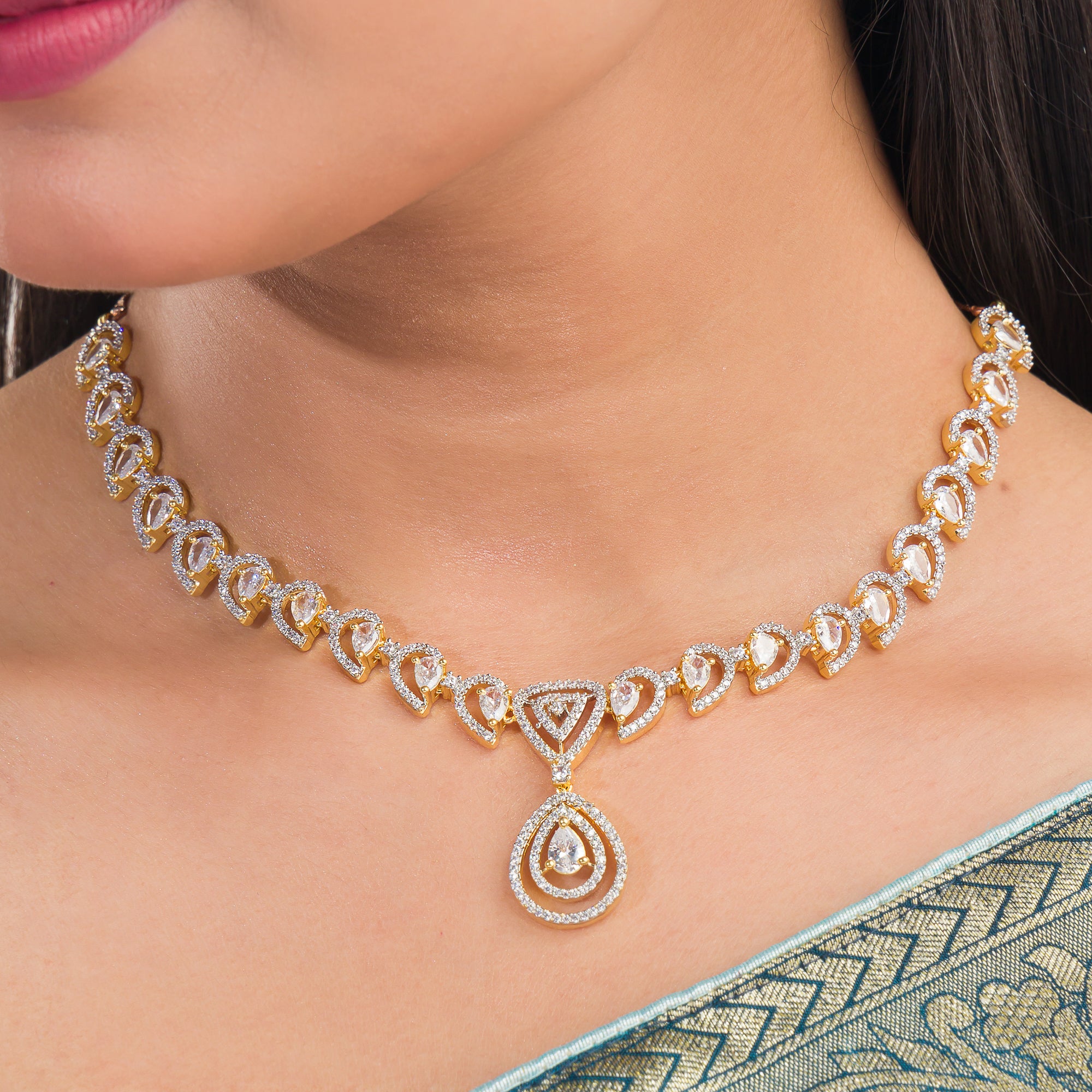 Golden polish zircon necklace set with matching earrings, blending luxury and elegance.
