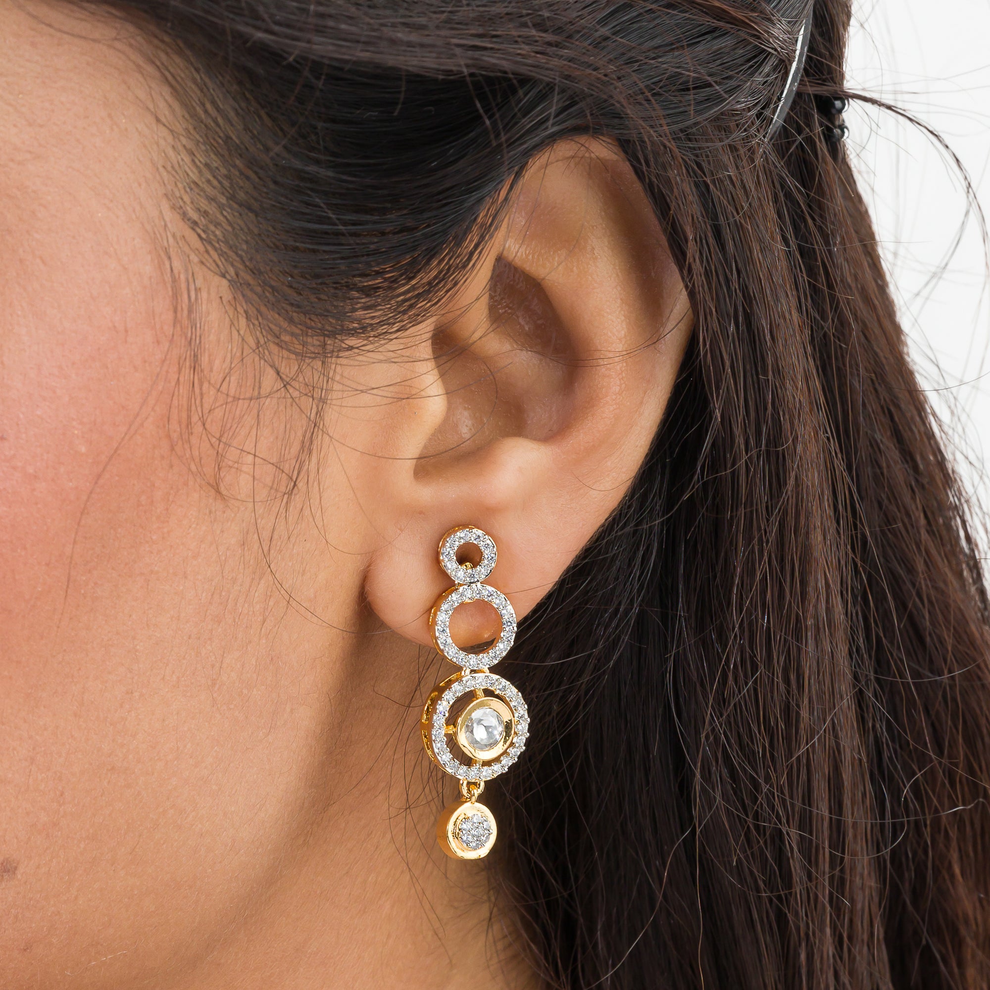 Golden polish zircon necklace set with matching earrings, offering luxury and elegance.
