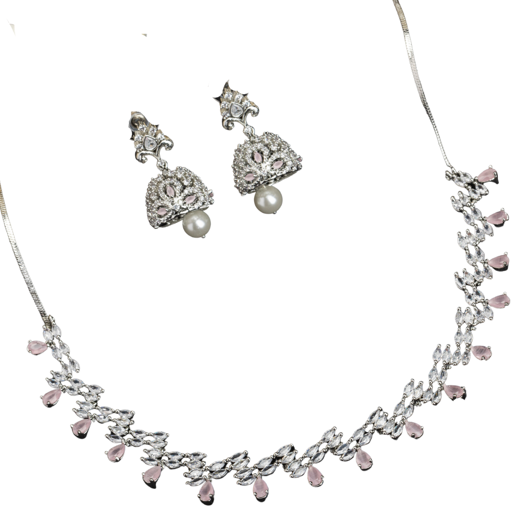 Orchid-colored zircon necklace set with matching jhumkas for an elegant party look.
