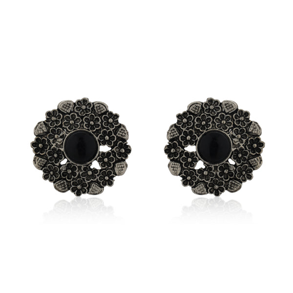 Vintage oxidized silver finger ring with intricate patterns and an antique finish.
