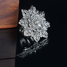 Vintage-inspired oxidized floral design finger ring with intricate patterns and antique finish.
