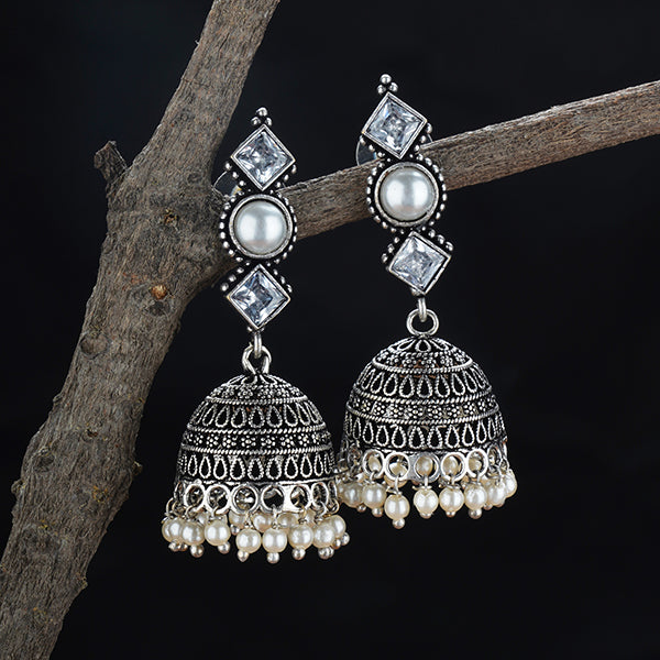 Intricately detailed oxidised jhumka earrings, showcasing a traditional design for a timeless look."
