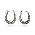 "Elegant 925 silver hoop earrings with a sleek design, adding sophistication to any look."
