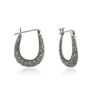 "Elegant 925 silver hoop earrings with a sleek design, adding sophistication to any look."
