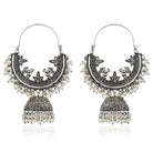 Beautiful oxidized jhumka earrings with intricate detailing for a traditional festive look.
