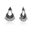 Elegant oxidized hoop earrings with intricate vintage design for festive outfits.
