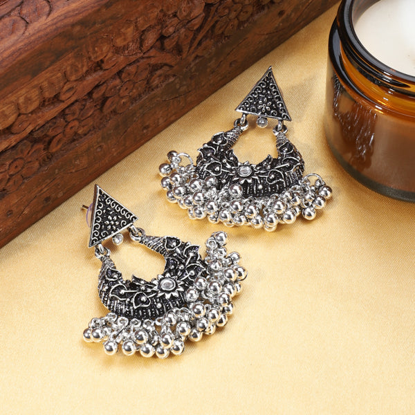 Elegant oxidized hoop earrings with intricate vintage design for festive outfits.
