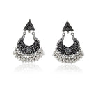 Elegant oxidized hoop earrings with intricate vintage design for festive outfits.
