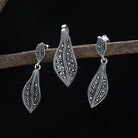 Elegant 925 sterling silver pendant set with delicate leaf design for casual natural charm.
