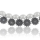  Stylish oxidized choker with floral design and white pearls, adding vintage charm to festive looks.
