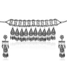 Stylish oxidized choker set with matching earrings and bracelet for a complete festive ensemble.
