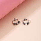 Delicate 925 silver hoop earrings with small ring design for a subtle, stylish touch.
