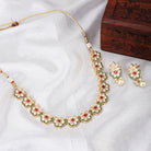 Exquisite Goddess Laxmi crafted temple necklace set with intricate design for festive occasions.
