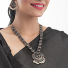 Intricate oxidized necklace set with a beautiful peacock design for a festive look.
