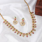 Gold-tone short necklace set with vibrant multicolor stones and matching earrings, perfect for celebrations.
