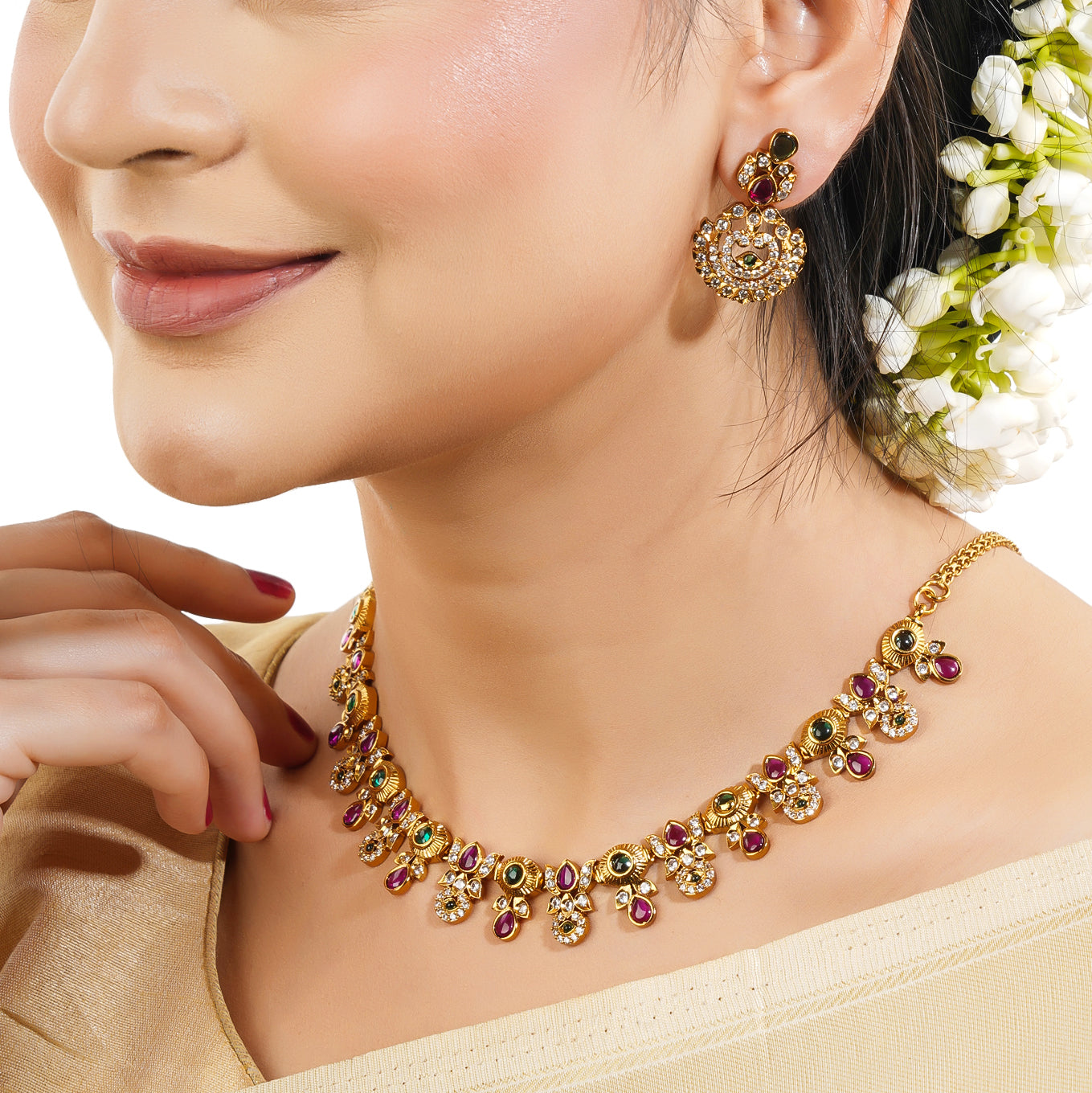 Gold-tone short necklace set with vibrant multicolor stones and matching earrings, perfect for celebrations.
