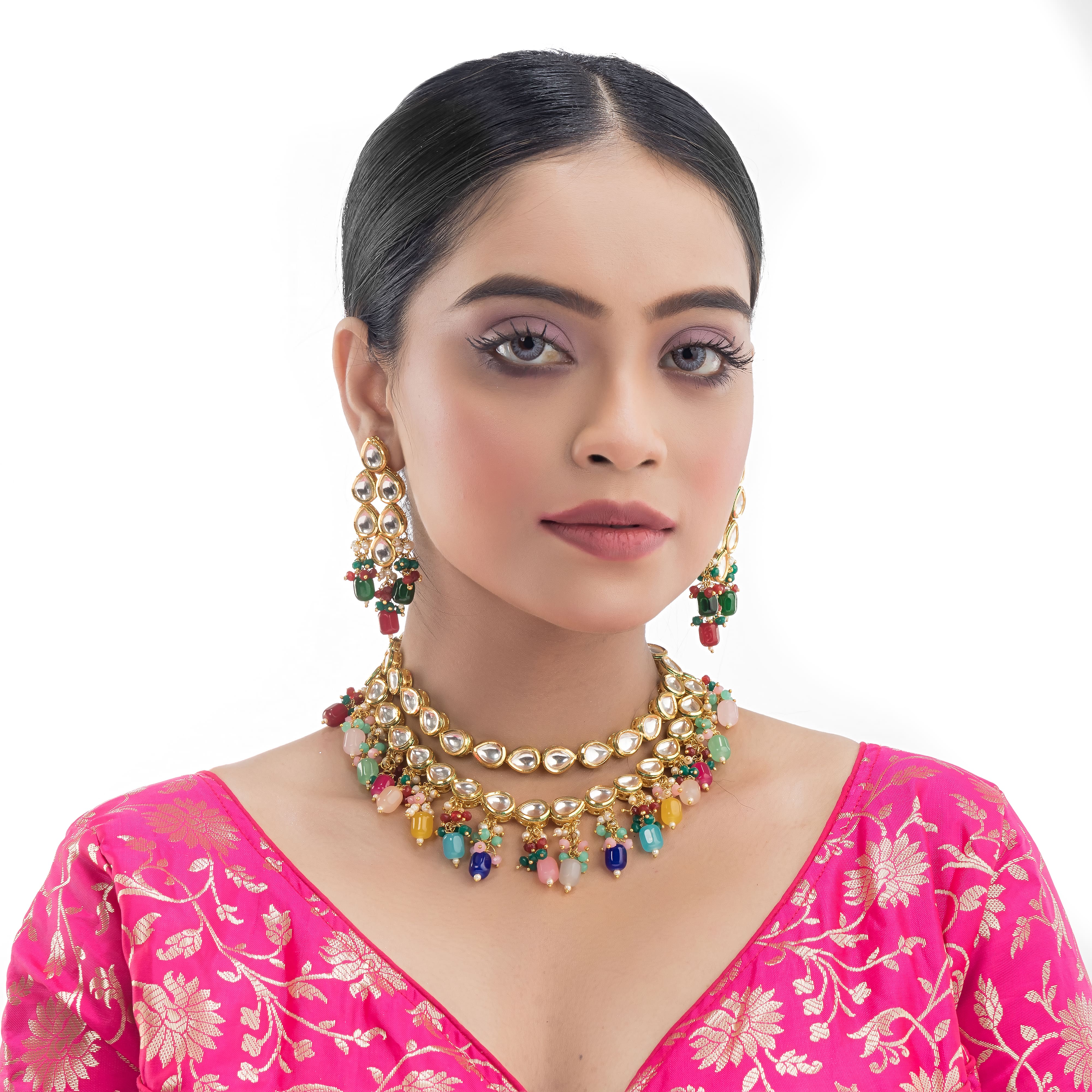 "Elegant double-layer Kundan necklace set with multicolor pearls, perfect for a vibrant festive look."
