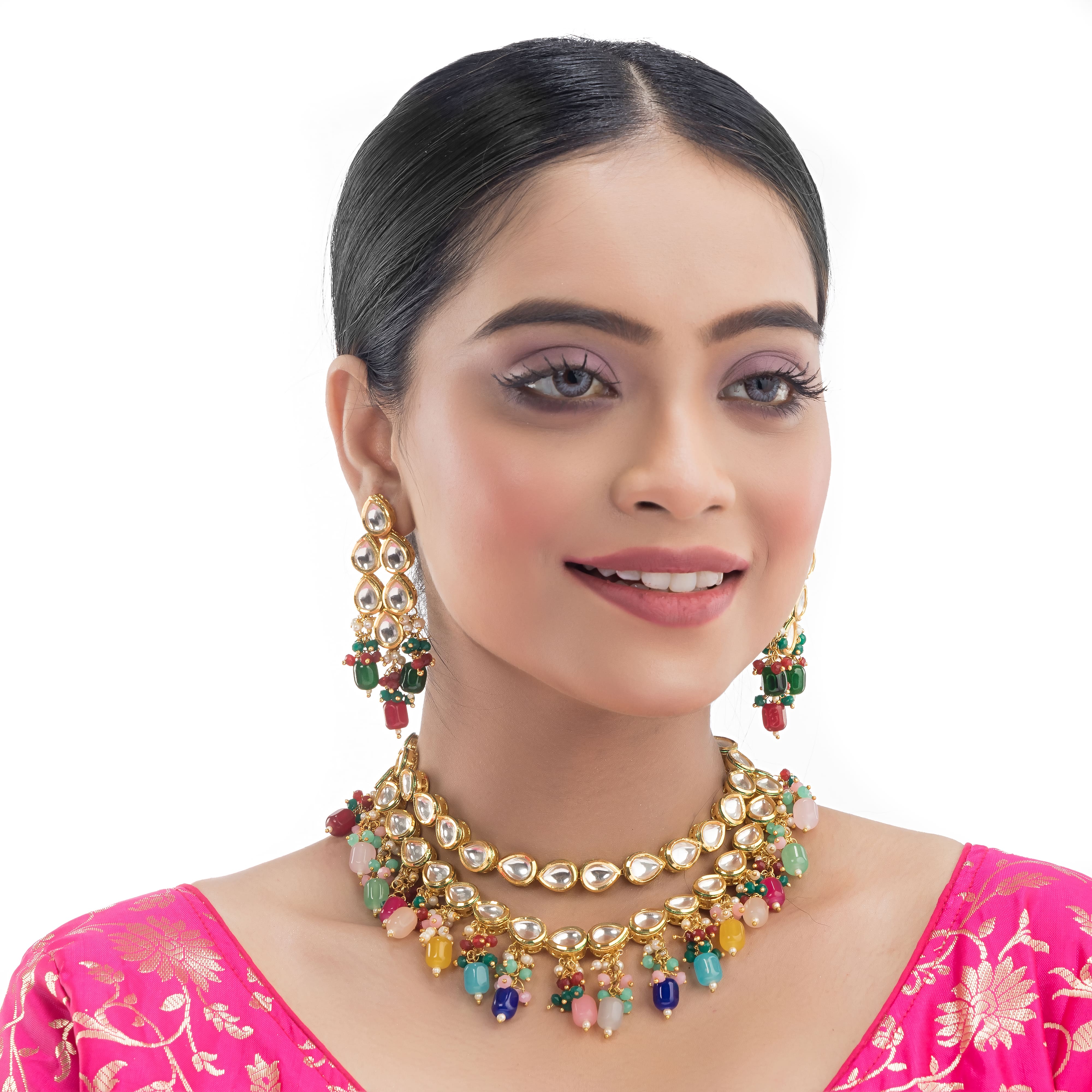 "Elegant double-layer Kundan necklace set with multicolor pearls, perfect for a vibrant festive look."
