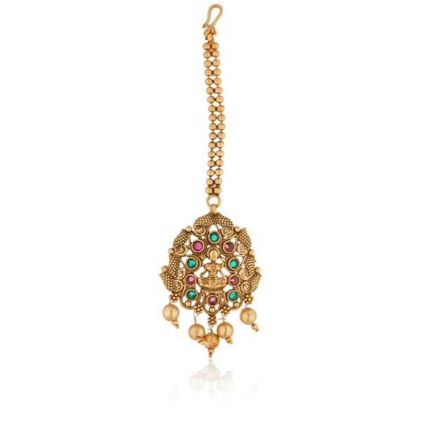 "Goldtone Laxmi Maa crafted long necklace set with matching earrings and Maang Tikka for festive elegance."
