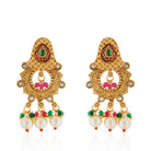 "Classic goldtone long necklace set with matching earrings for a festive, elegant look."
