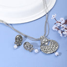 "Charming oxidized silver short necklace set with vintage detailing for any festive outfit."
