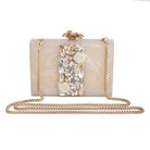 Embellished salmon resin clutch with extra pocket and sturdy sling for a chic and convenient style.
