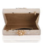 Embellished salmon resin clutch with extra pocket and sturdy sling for a chic and convenient style.
