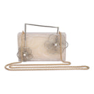 Salmon resin clutch with unique flower handles, heavy sling, and extra pocket for convenience.
